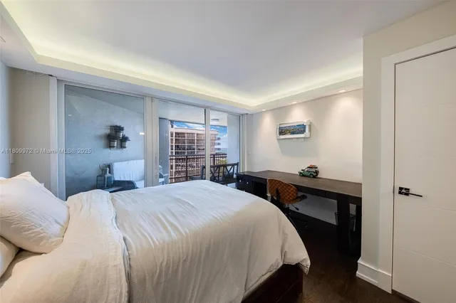 a balcony with furniture and garden view