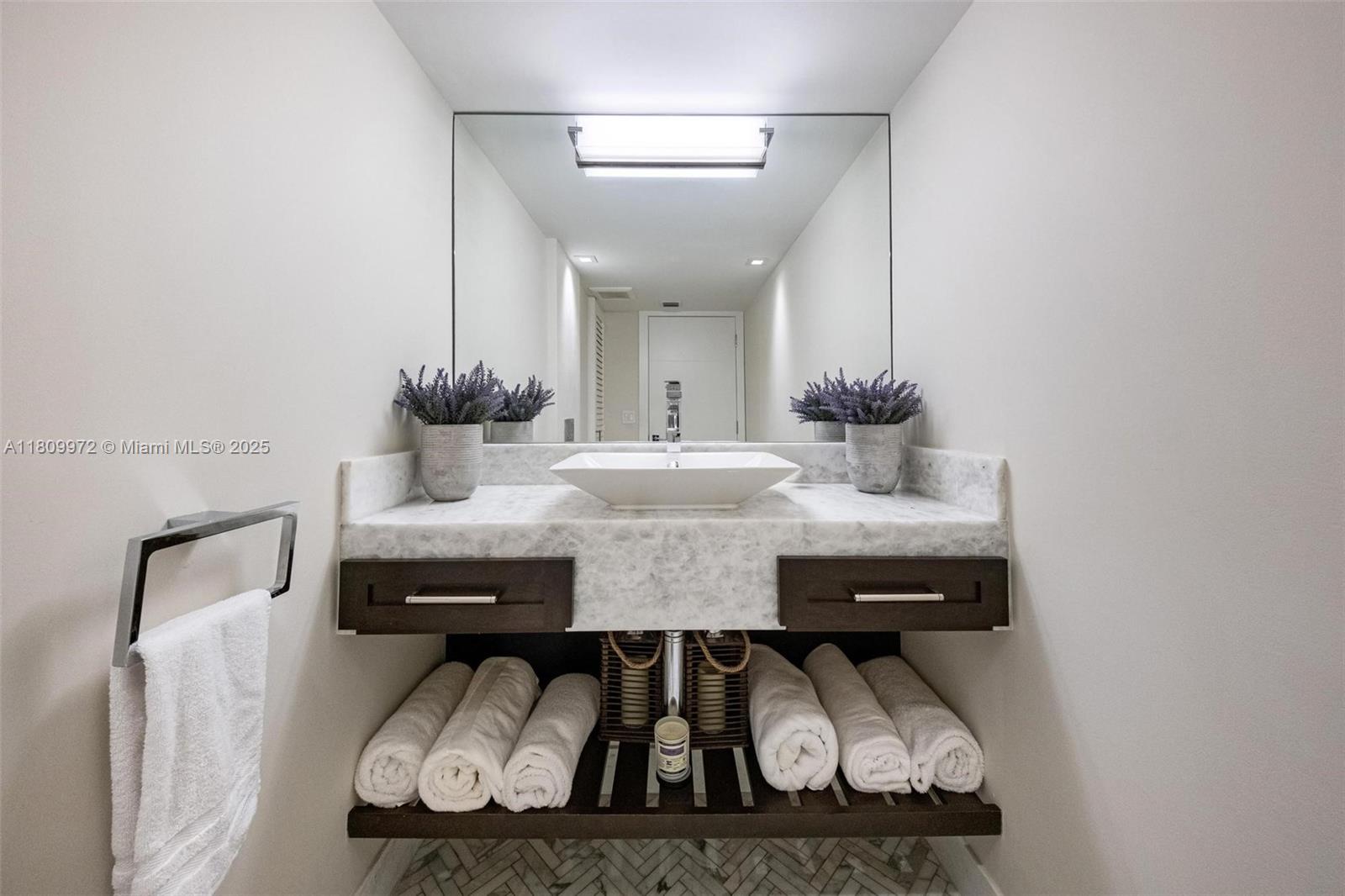 2901 South Bayshore Drive, Unit 17G/H Miami, FL 33133 - Photo 58 of 81 a dining room with furniture and wooden floor