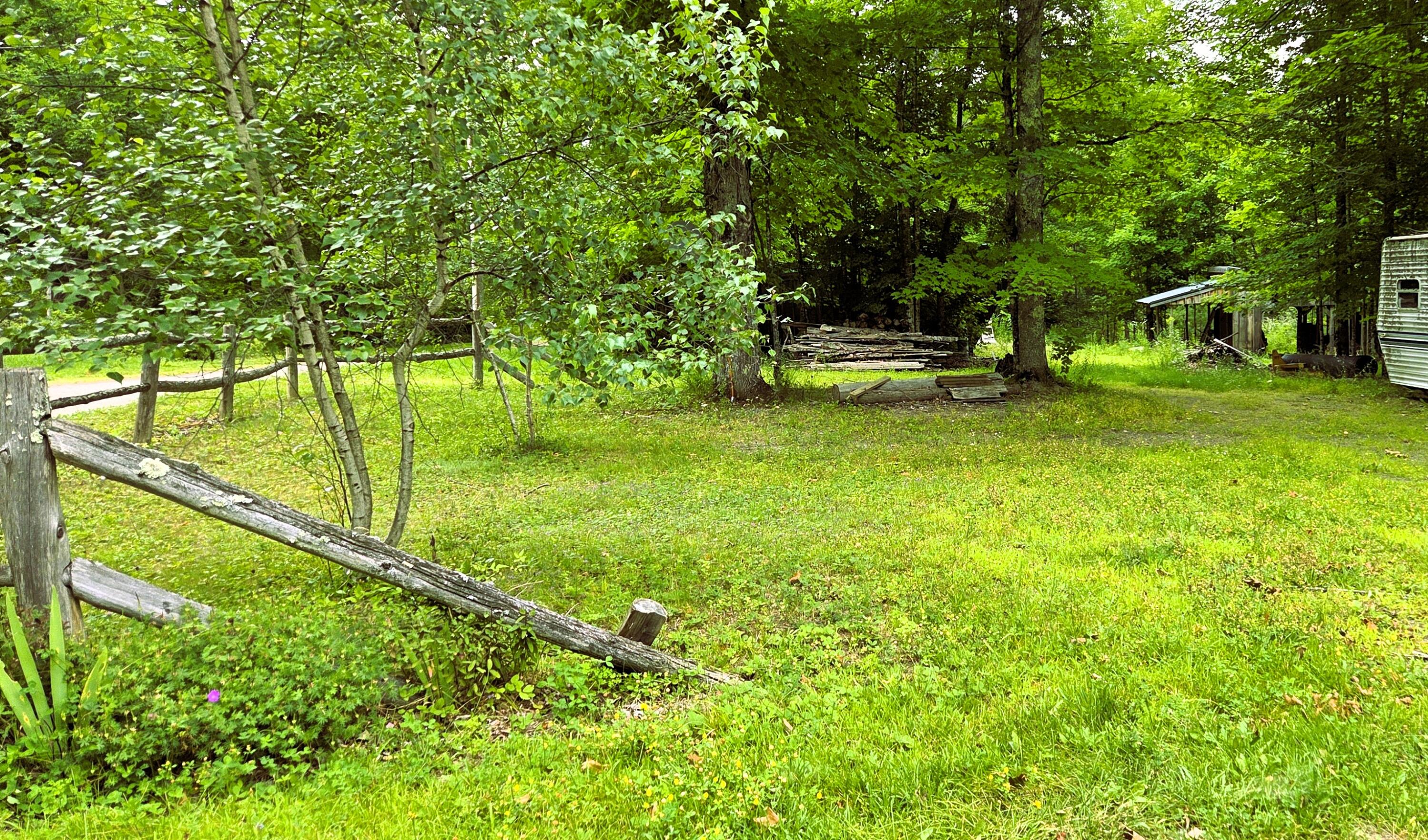 83 Brooks Pond Road Corinna, ME 04928 - Photo 4 of 80 left side