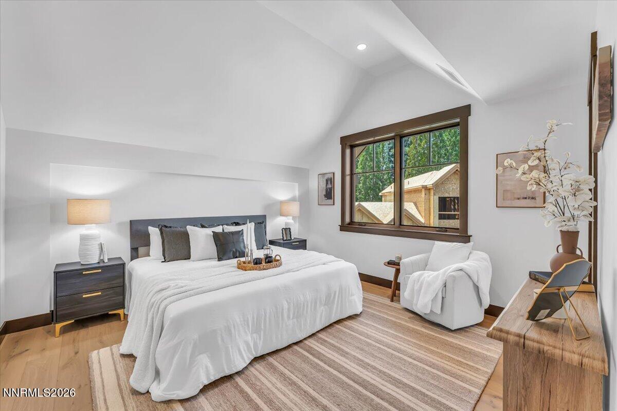 46 Beach Club Drive, Unit 905 Stateline, NV 89449 - Photo 14 of 37 a bedroom with two beds and a large window