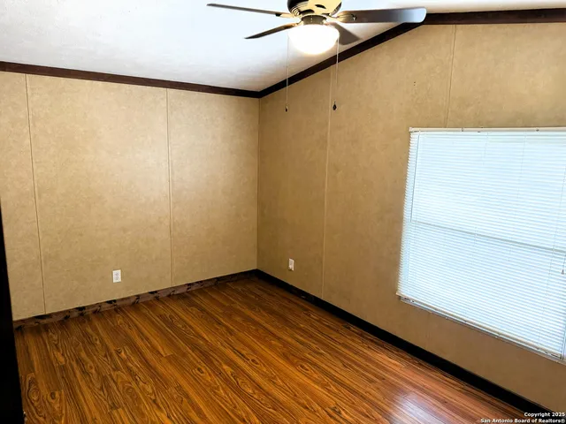 a view of a big room with wooden floor