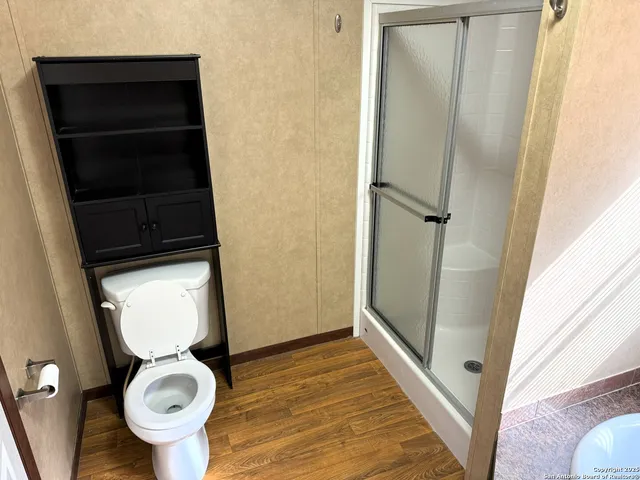 a bathroom with a toilet and a sink