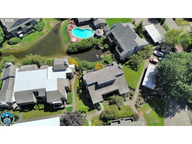 a view of a house with a swimming pool