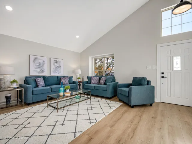 a living room with furniture and a couch