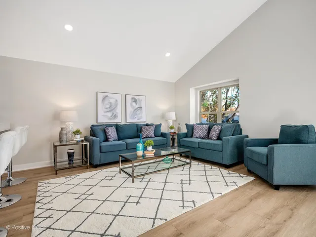 a living room with furniture and a couch