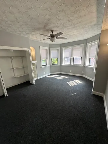 a view of empty room with windows