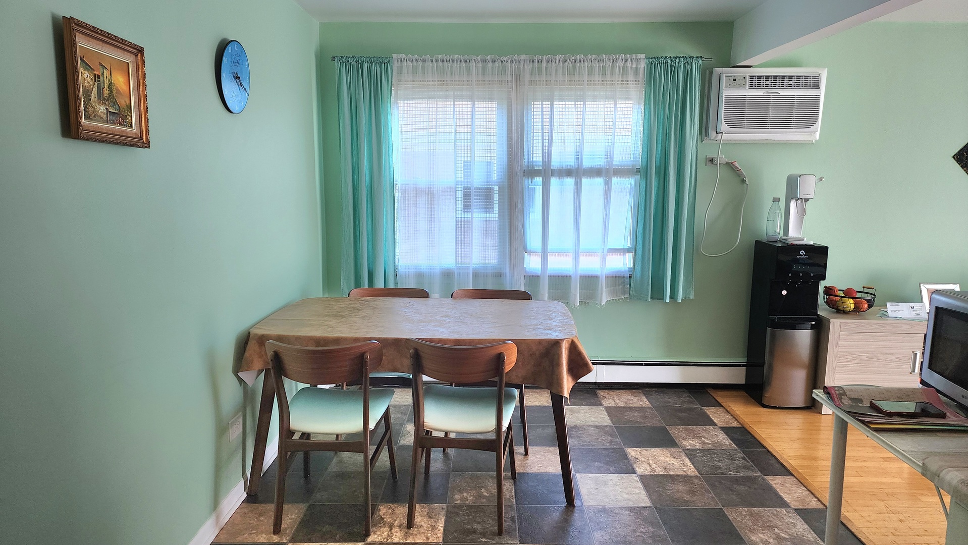 8125 South Roberts Road Bridgeview, IL 60455 - Photo 7 of 11 a view of a dining room with furniture and a window