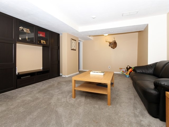 8819 Gardner Road Fox River Grove, IL 60021 - Photo 14 of 24 a living room with furniture and a flat screen tv