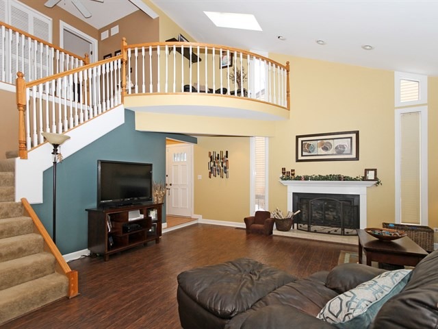 8819 Gardner Road Fox River Grove, IL 60021 - Photo 6 of 24 a living room with furniture and a fireplace
