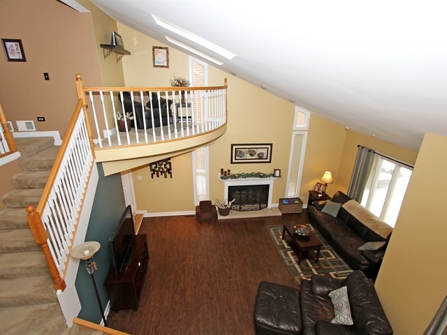 8819 Gardner Road Fox River Grove, IL 60021 - Photo 8 of 24 a living room with furniture and a fireplace