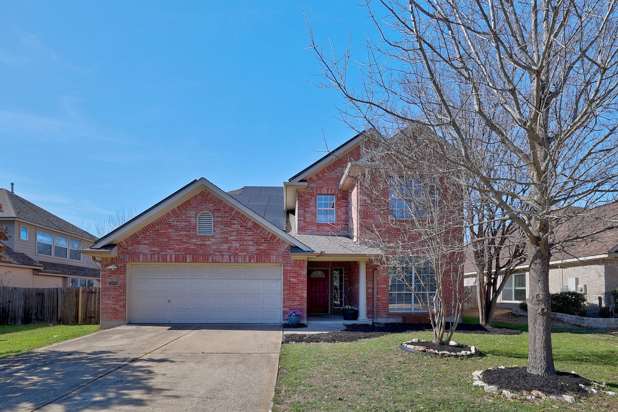 2307 Hayfield Square Pflugerville, TX 78660 - Photo 2 of 40 a front view of house with yard