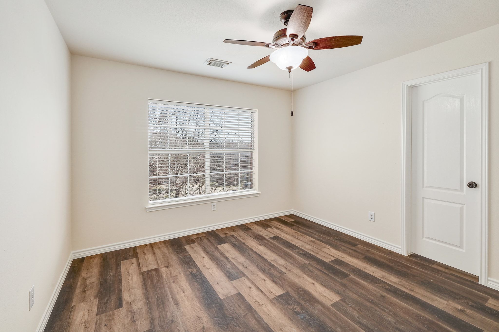 2307 Hayfield Square Pflugerville, TX 78660 - Photo 31 of 40 a view of an empty room with a window