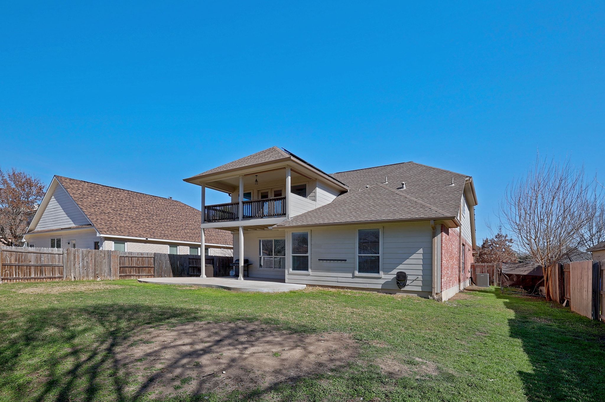 2307 Hayfield Square Pflugerville, TX 78660 - Photo 39 of 40 a view of a house with a backyard