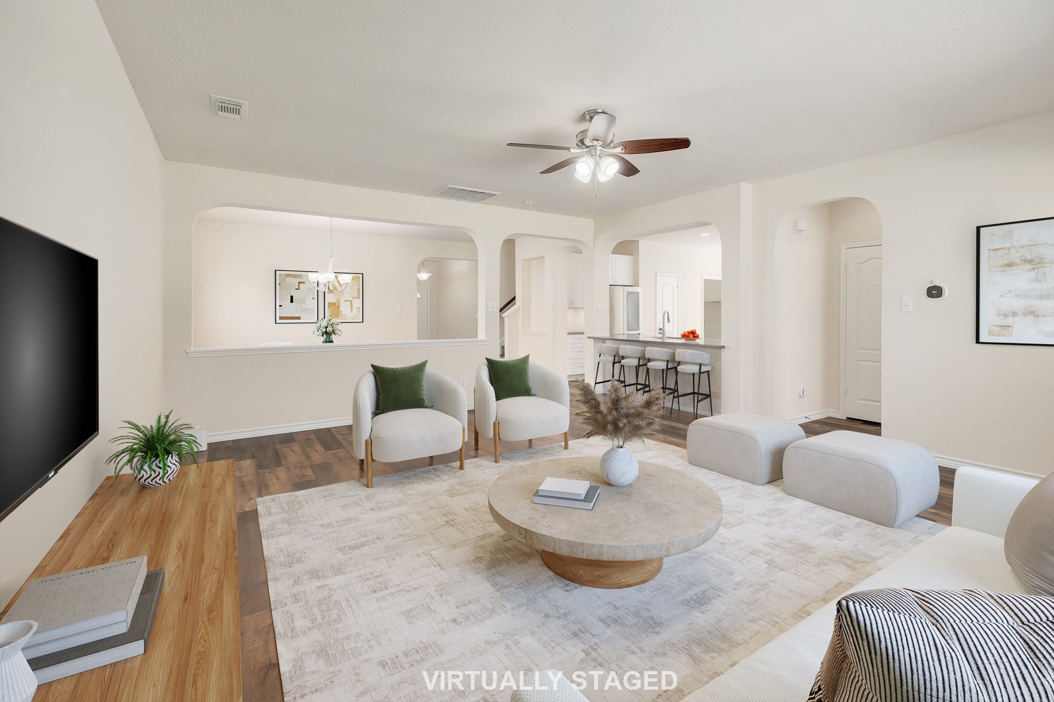 2307 Hayfield Square Pflugerville, TX 78660 - Photo 6 of 40 a living room with furniture and a dining table with wooden floor