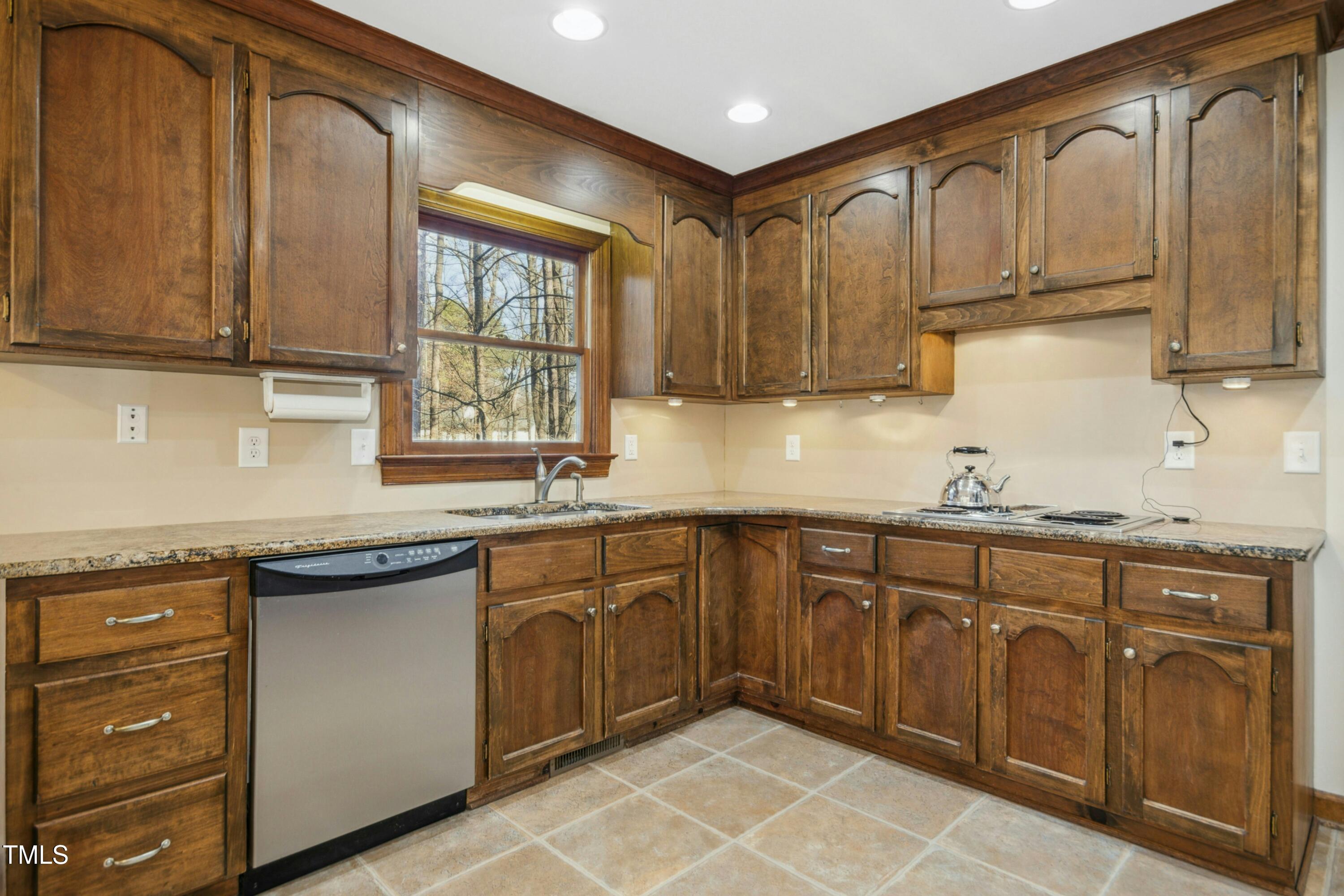 8808 Limestone Court Raleigh, NC 27615 - Photo 20 of 64 Granite Countertops