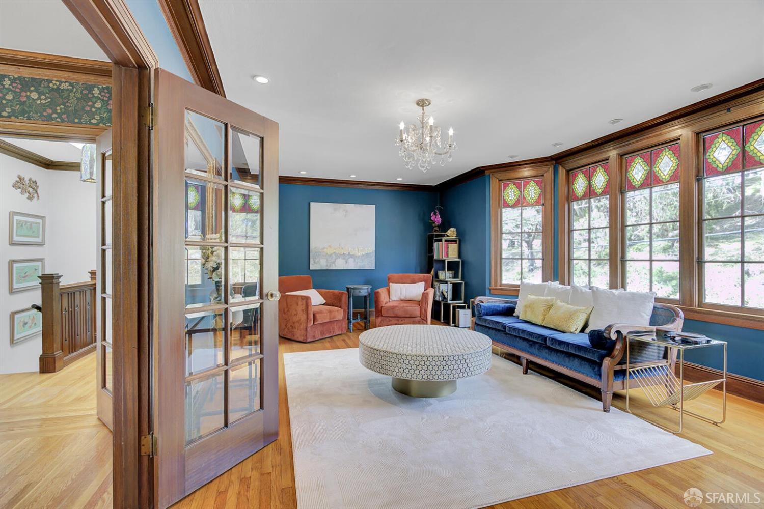 3927 Clement Street San Francisco, CA 94121 - Photo 13 of 72 a living room with furniture and a large window