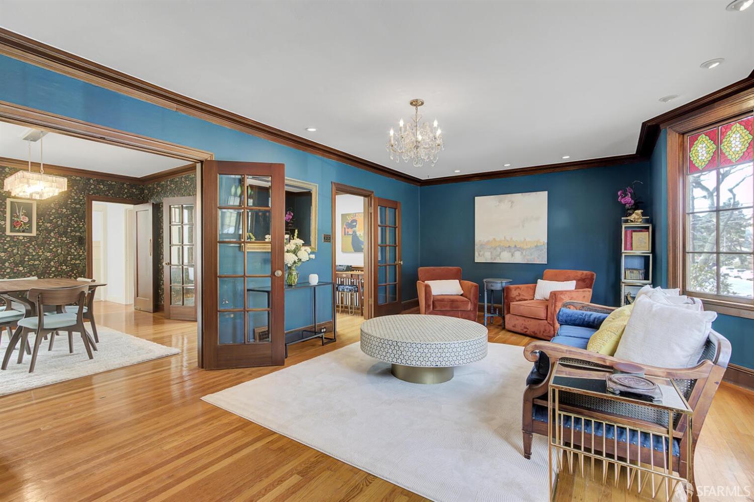 3927 Clement Street San Francisco, CA 94121 - Photo 16 of 72 a living room with furniture and a wooden floor