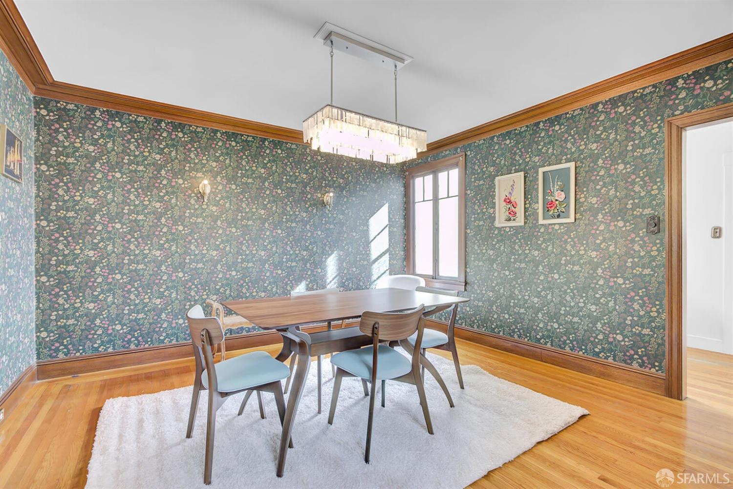3927 Clement Street San Francisco, CA 94121 - Photo 19 of 72 a view of a dining room with furniture and wooden floor