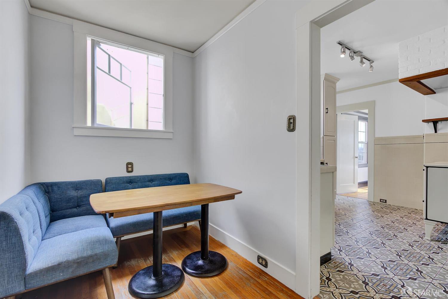 3927 Clement Street San Francisco, CA 94121 - Photo 23 of 72 a view of a livingroom with furniture and wooden floor