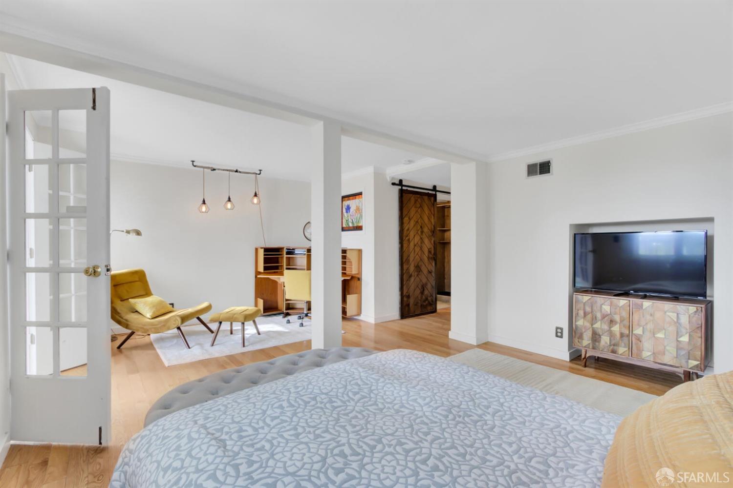 3927 Clement Street San Francisco, CA 94121 - Photo 40 of 72 a living room with furniture and a flat screen tv