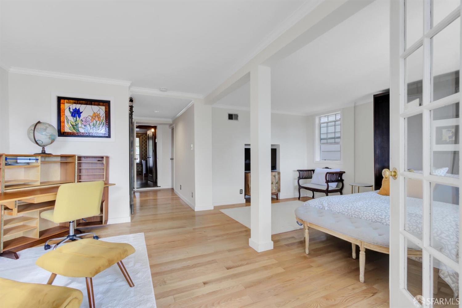 3927 Clement Street San Francisco, CA 94121 - Photo 43 of 72 a living room with furniture kitchen view and a wooden floor