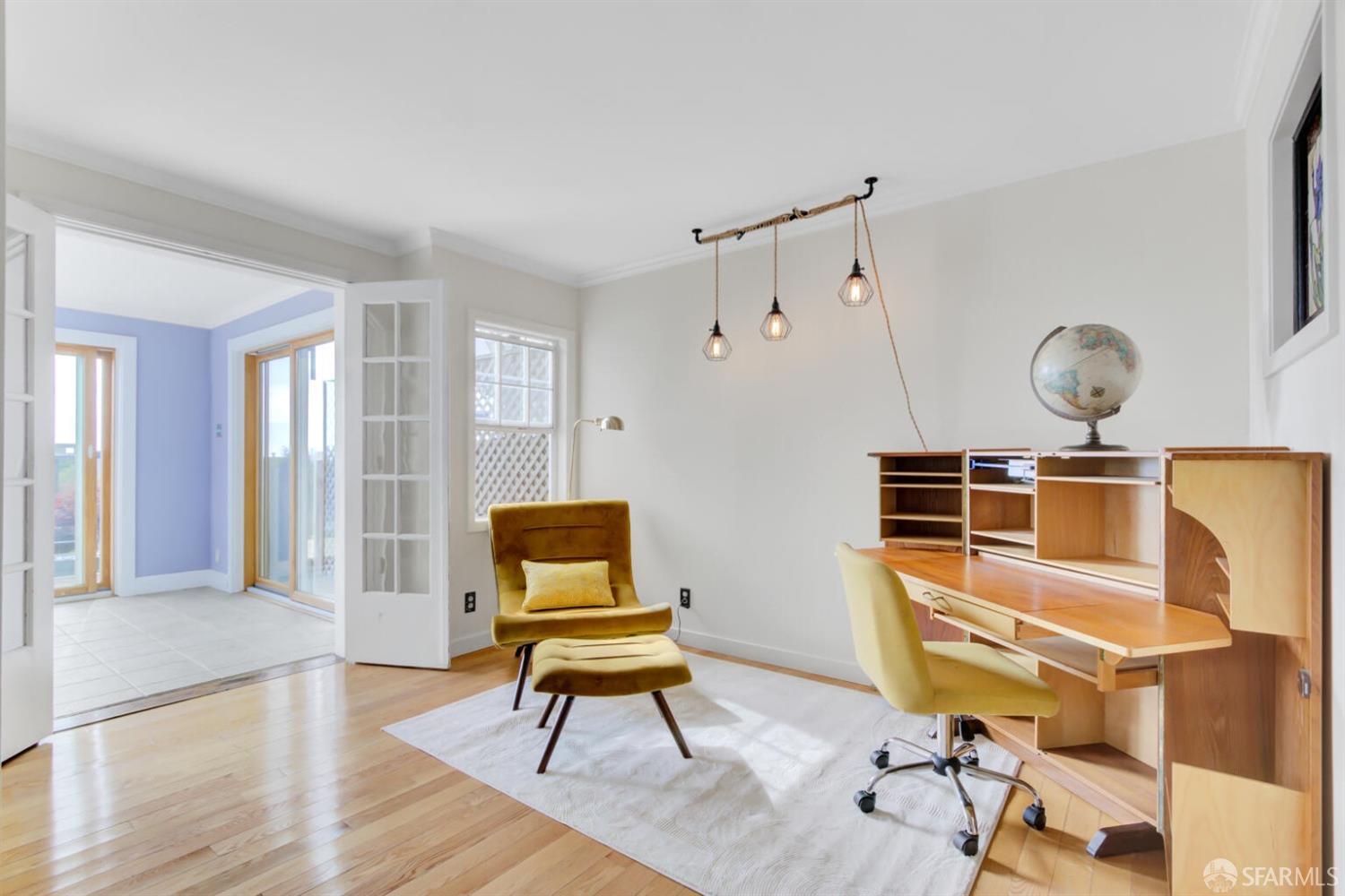 3927 Clement Street San Francisco, CA 94121 - Photo 45 of 72 a living room with furniture and a window