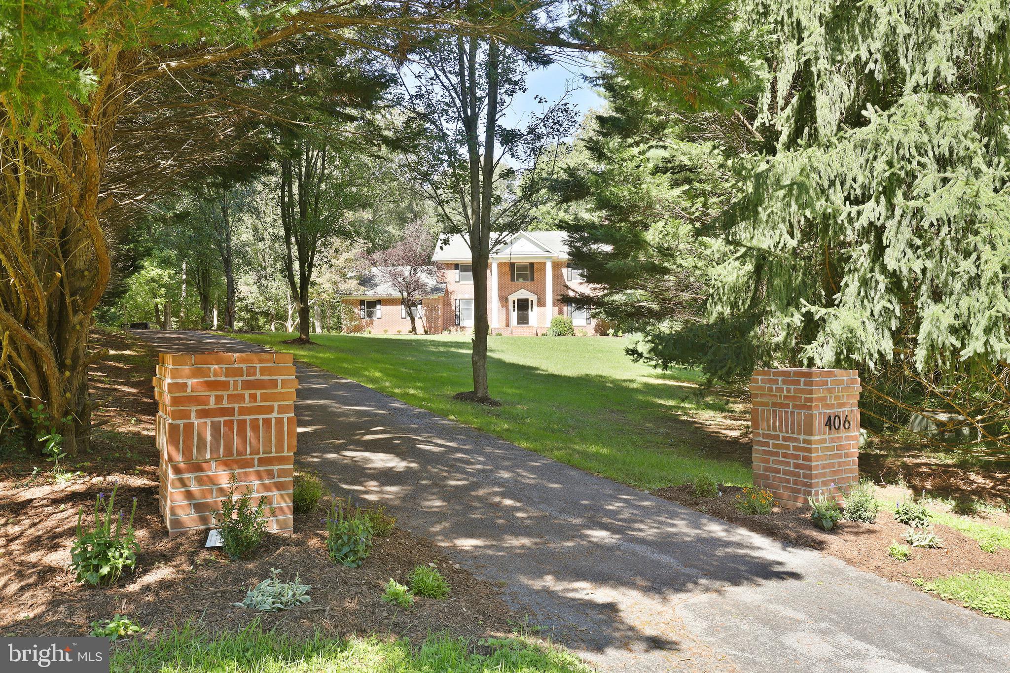 406 Cockeys Mill Road Reisterstown, MD 21136 - Photo 1 of 49 Private tree lined driveway