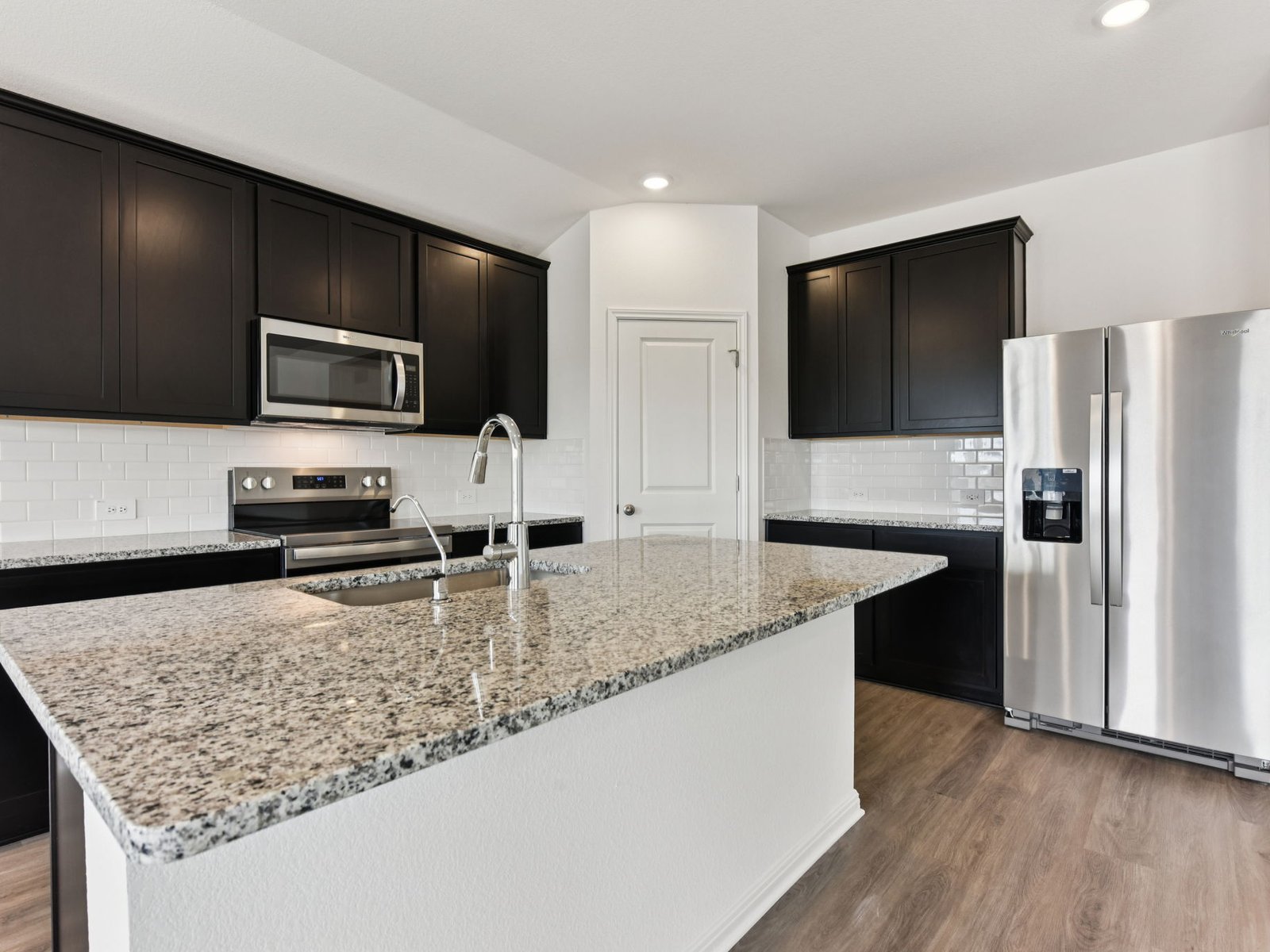 116 Hayburner Road Burnet, TX 78611 - Photo 3 of 12 Photo is not of the actual home, but is an inspirational photo of builder’s model home and may depict options, furnishings, and/or decorator features that are not included