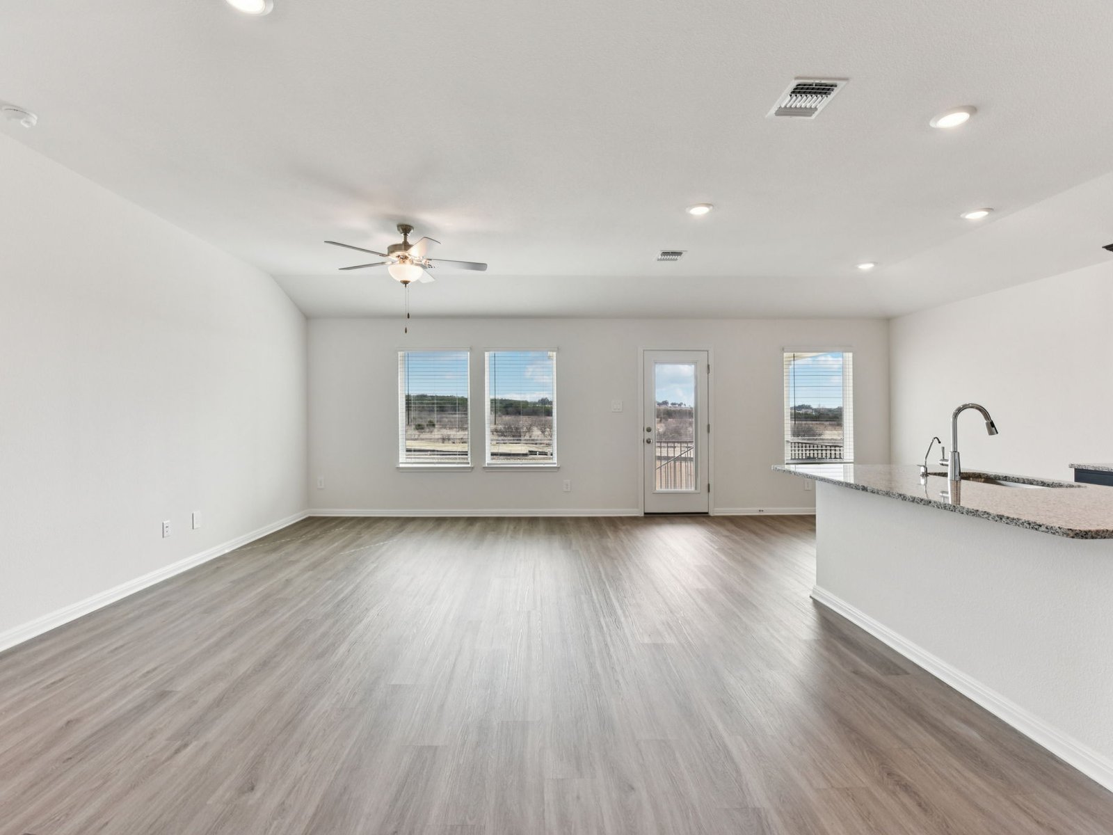 116 Hayburner Road Burnet, TX 78611 - Photo 4 of 12 Photo is not of the actual home, but is an inspirational photo of builder’s model home and may depict options, furnishings, and/or decorator features that are not included