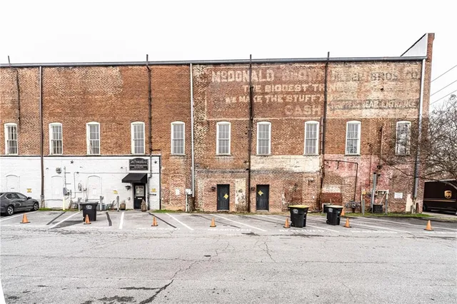 a city street lined with buildings and a street