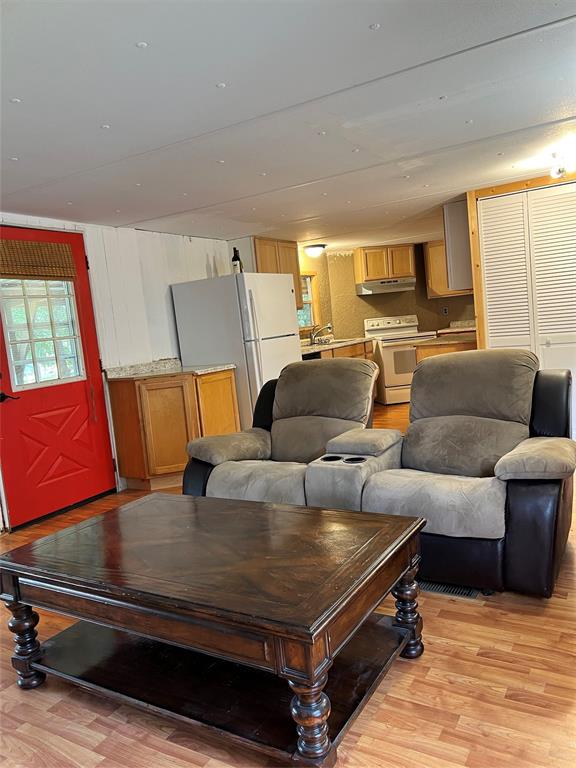 2334 San Bar Road, Unit 46 Graford, TX 76449 - Photo 4 of 37 a living room with furniture and a couch