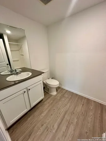 a bathroom with a sink and a toilet