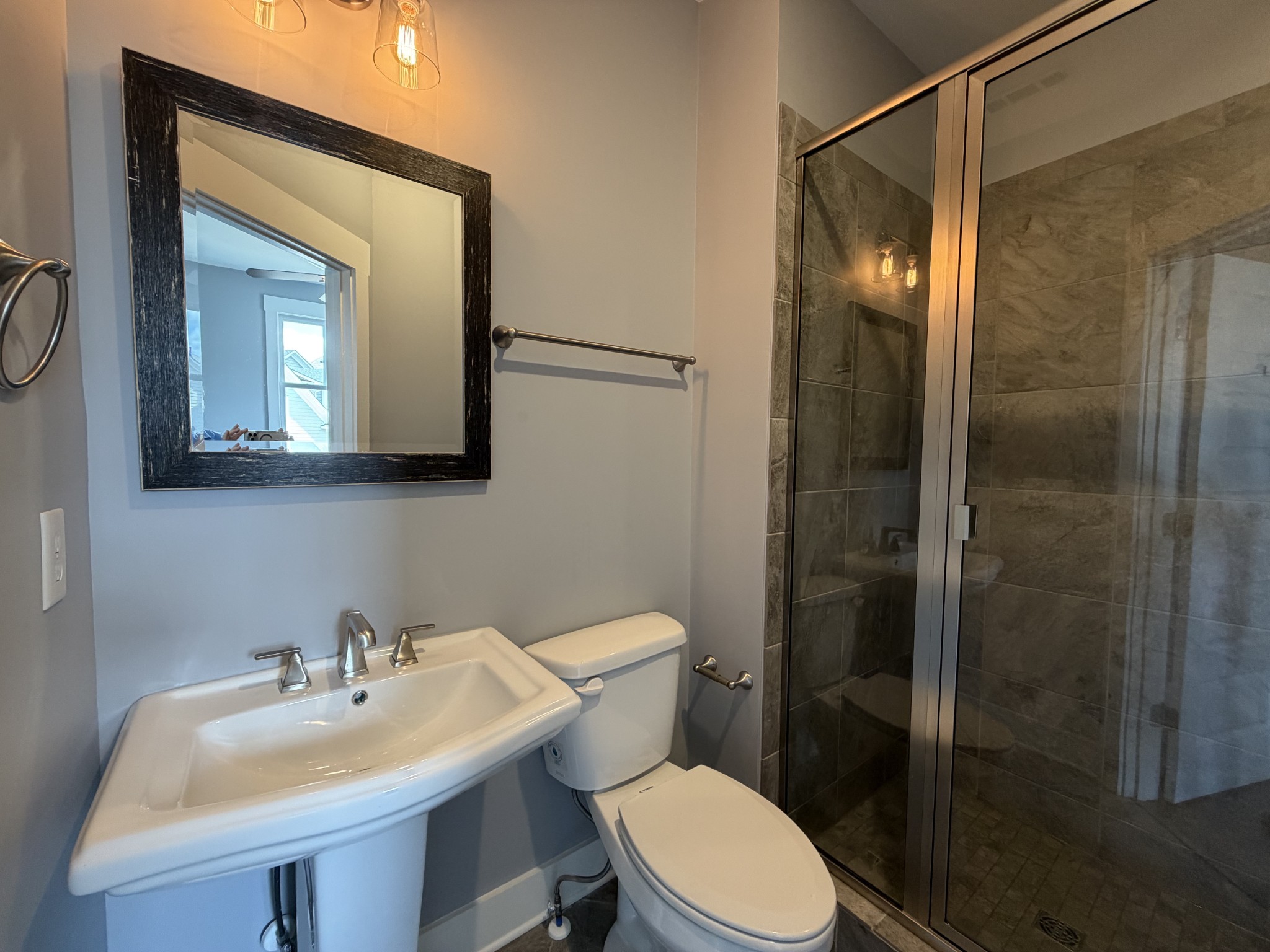 3097 Rural Plains Circle Franklin, TN 37064 - Photo 13 of 28 a bathroom with a toilet a sink and mirror