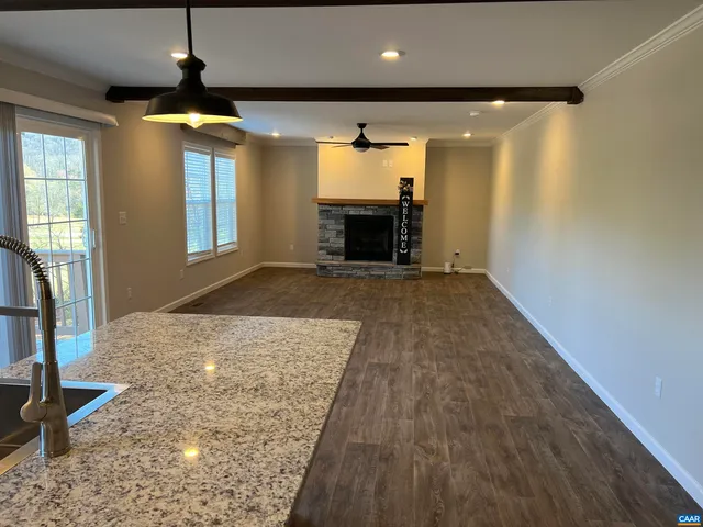 a view of front door with wooden floor