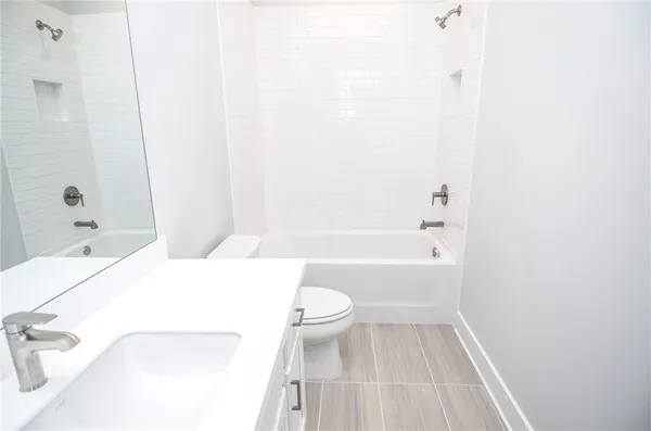 a view of a patio with couches table and chairs