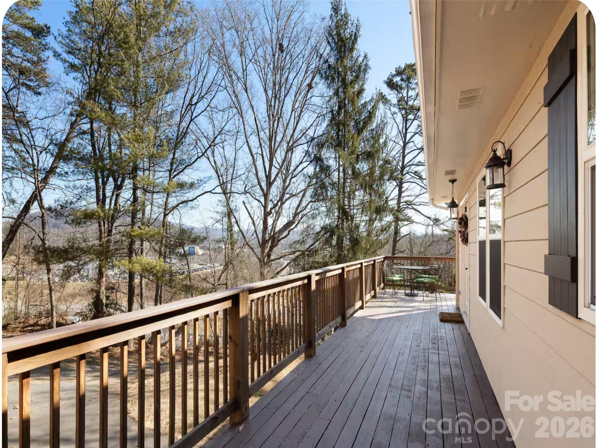 502 Long Shoals Road Arden, NC 28704 - Photo 21 of 32 a view of balcony with wooden floor and fence
