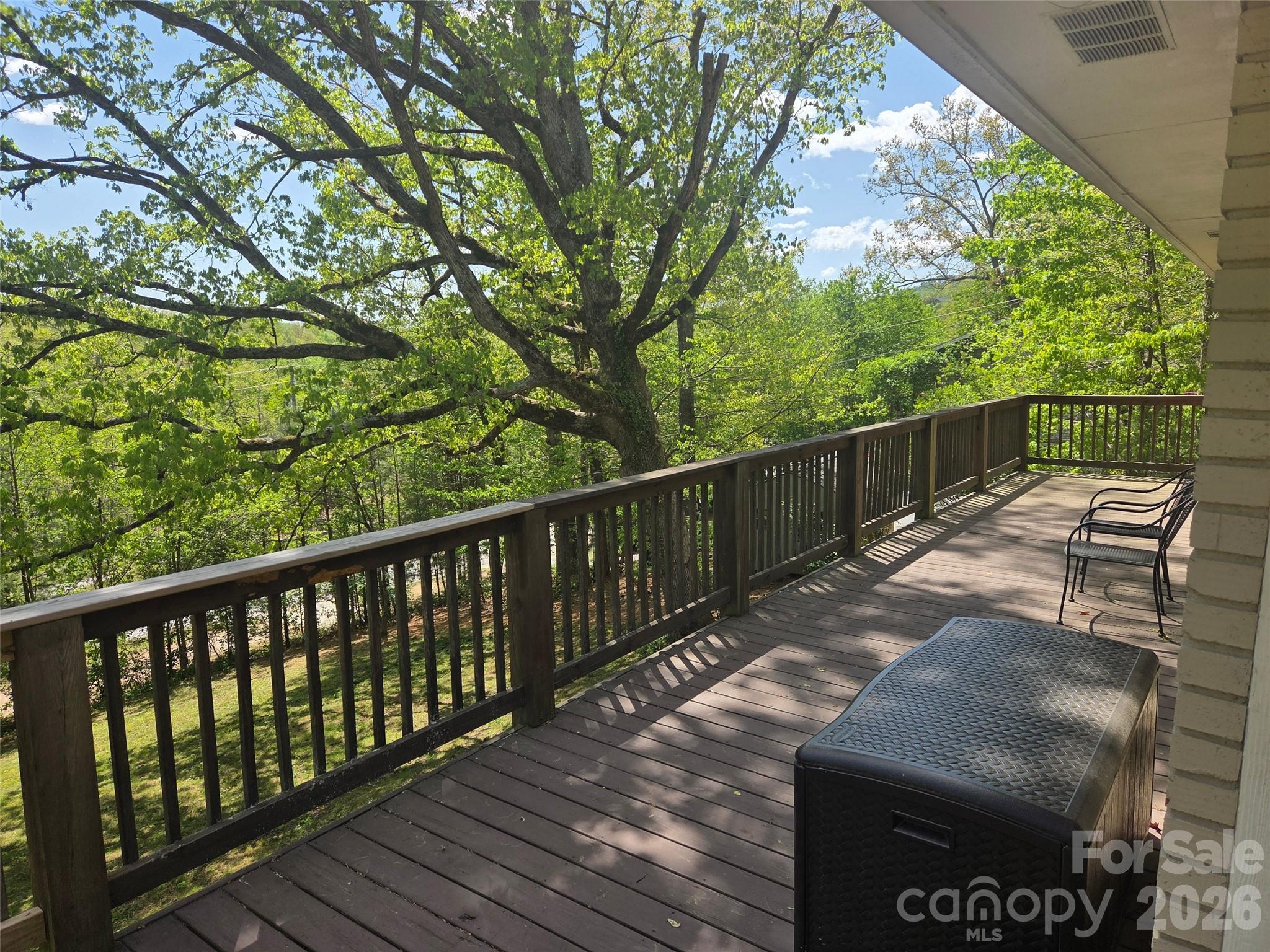 502 Long Shoals Road Arden, NC 28704 - Photo 29 of 32 a view of balcony with wooden floor and fence