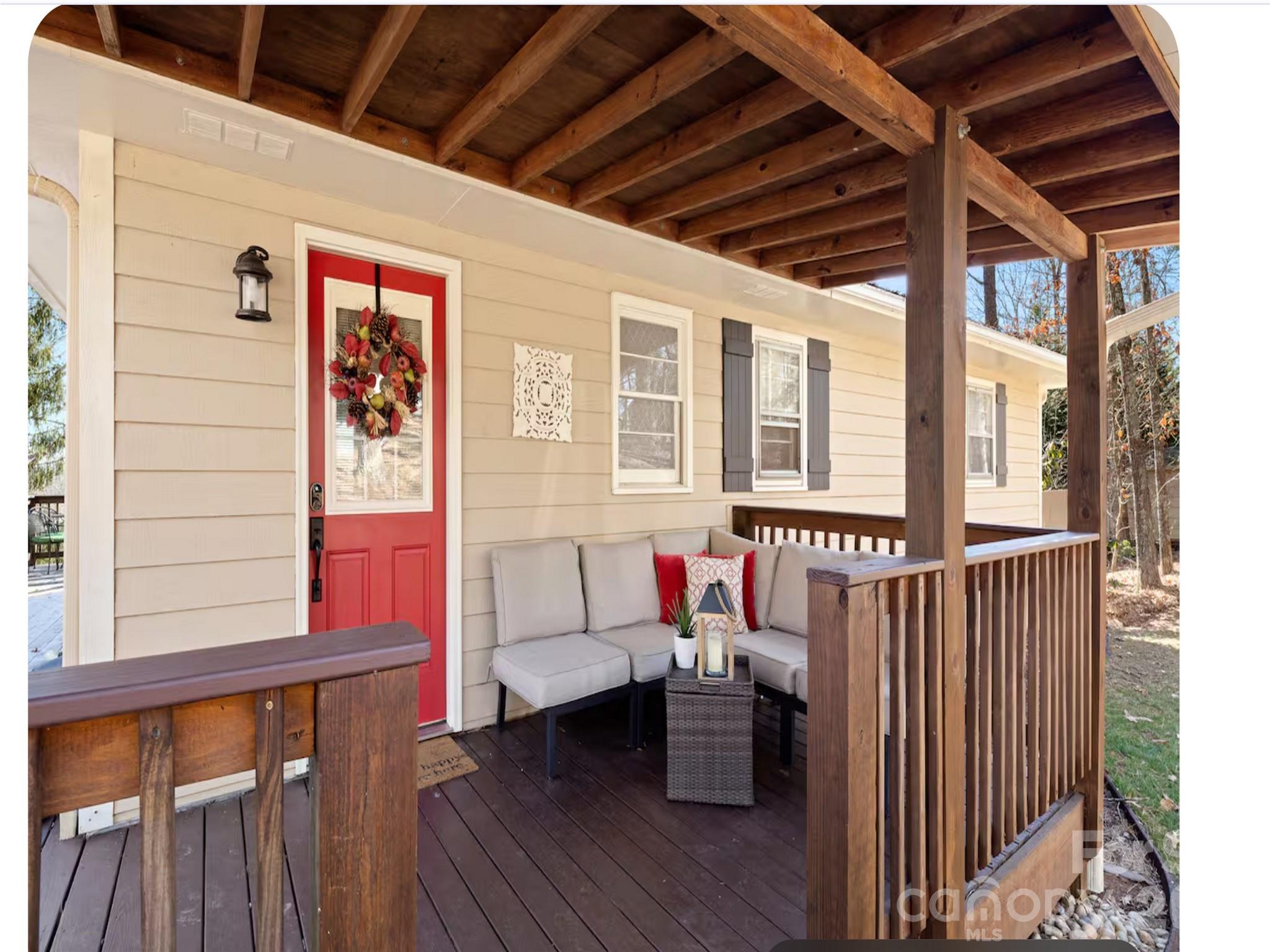 502 Long Shoals Road Arden, NC 28704 - Photo 3 of 32 a view of balcony with furniture