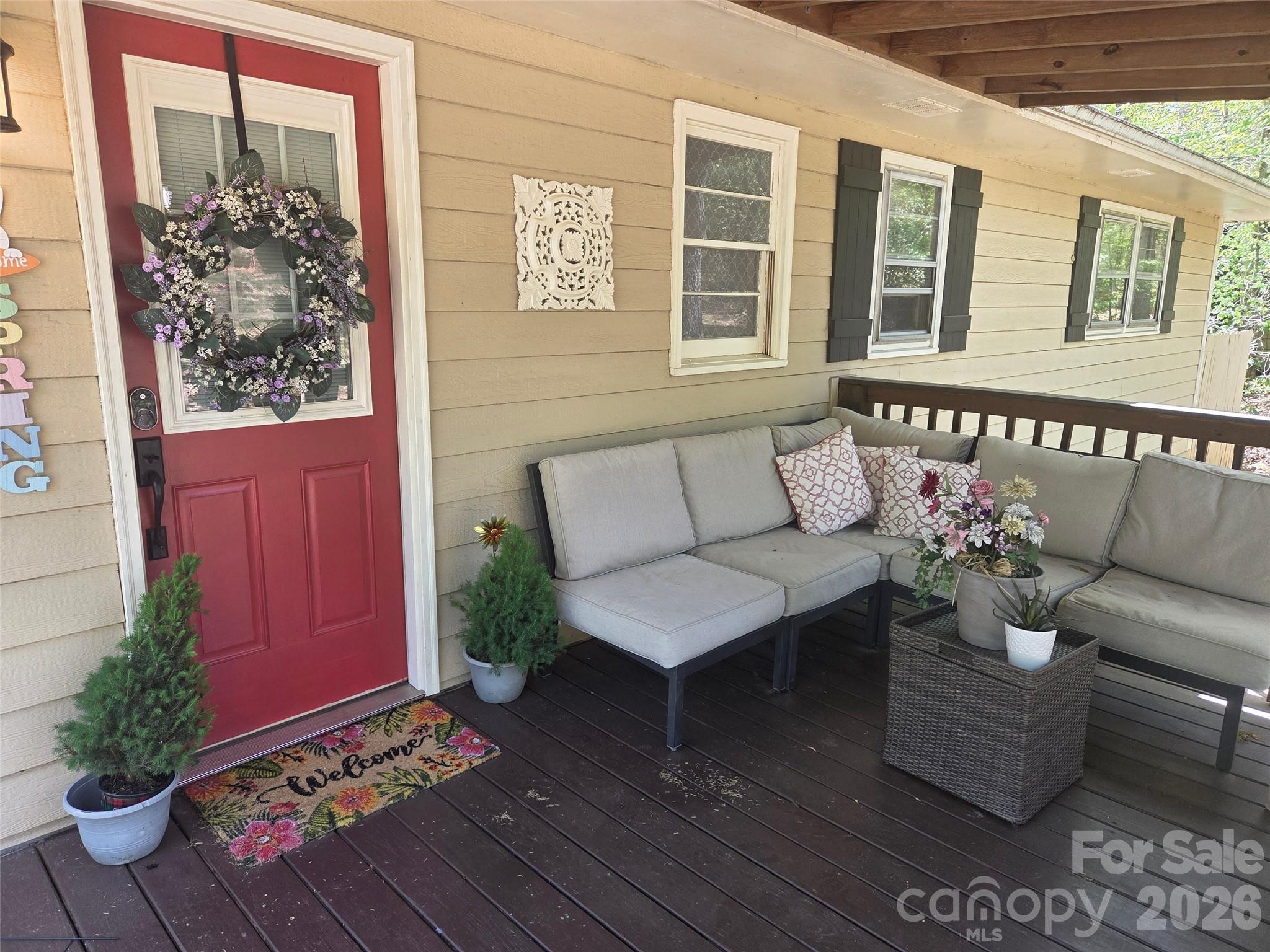 502 Long Shoals Road Arden, NC 28704 - Photo 4 of 32 a building outdoor space with patio furniture