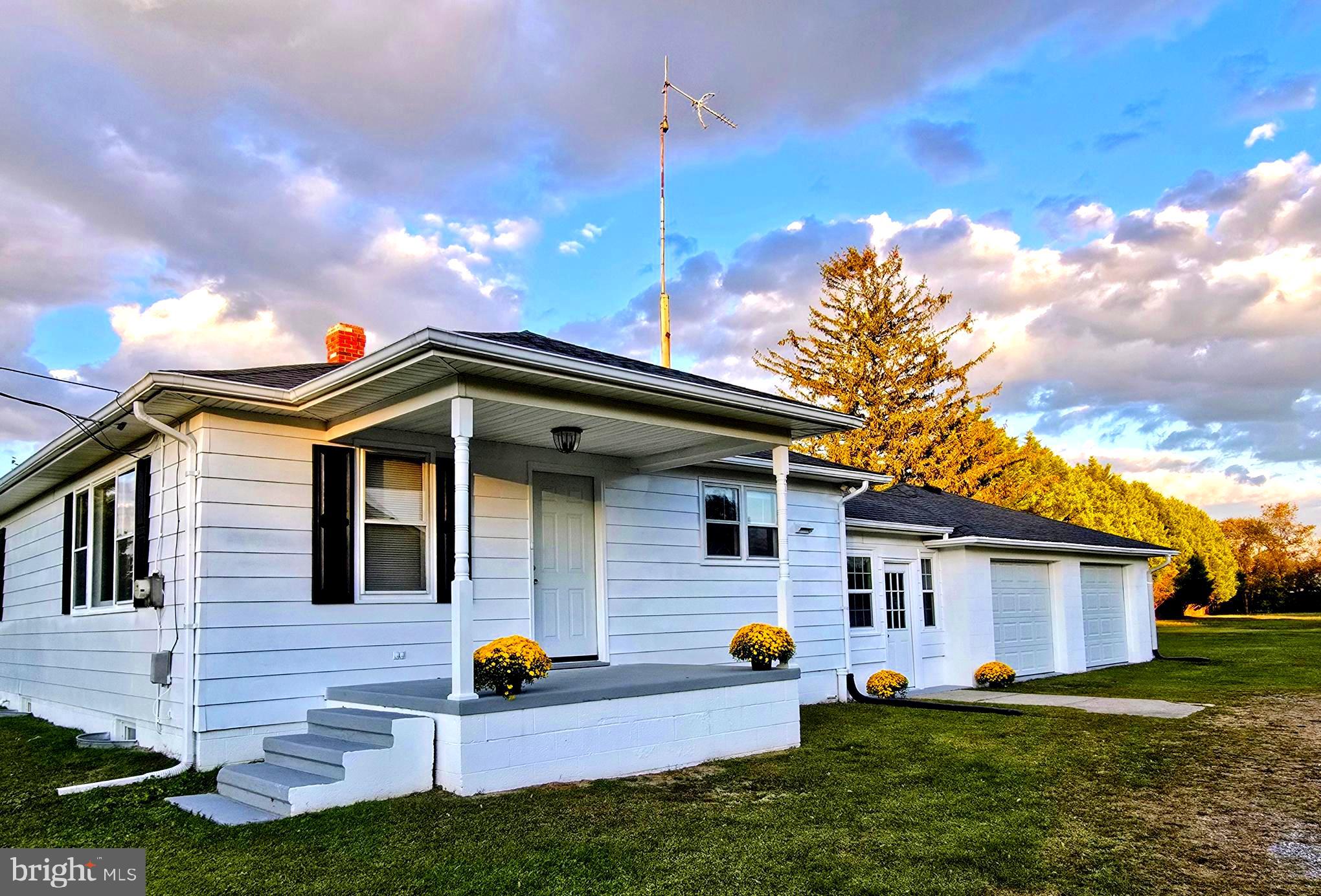a front view of house with yard