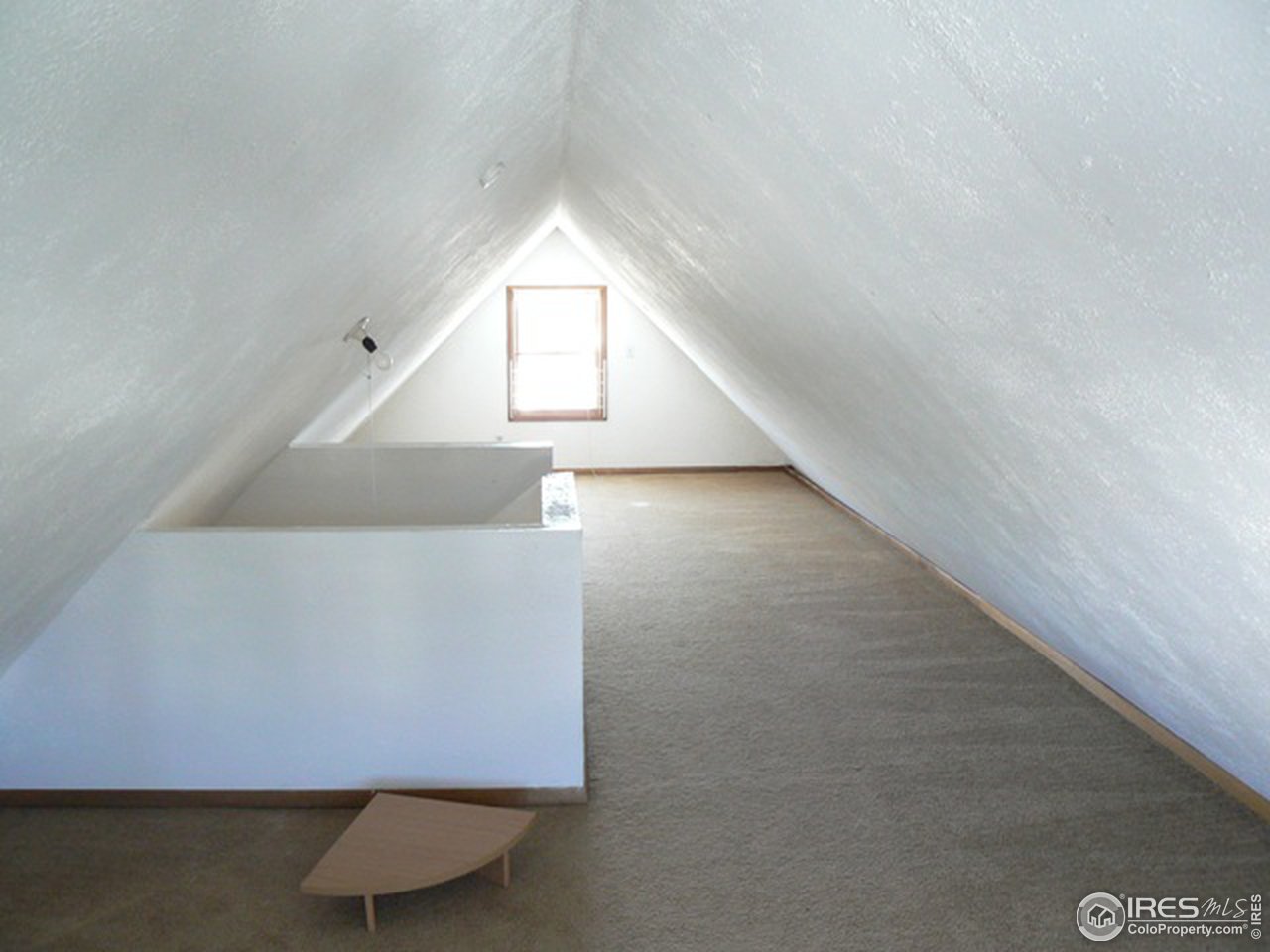 4160 Riverside Avenue Boulder, CO 80304 - Photo 10 of 17 an empty room with wooden floor and windows