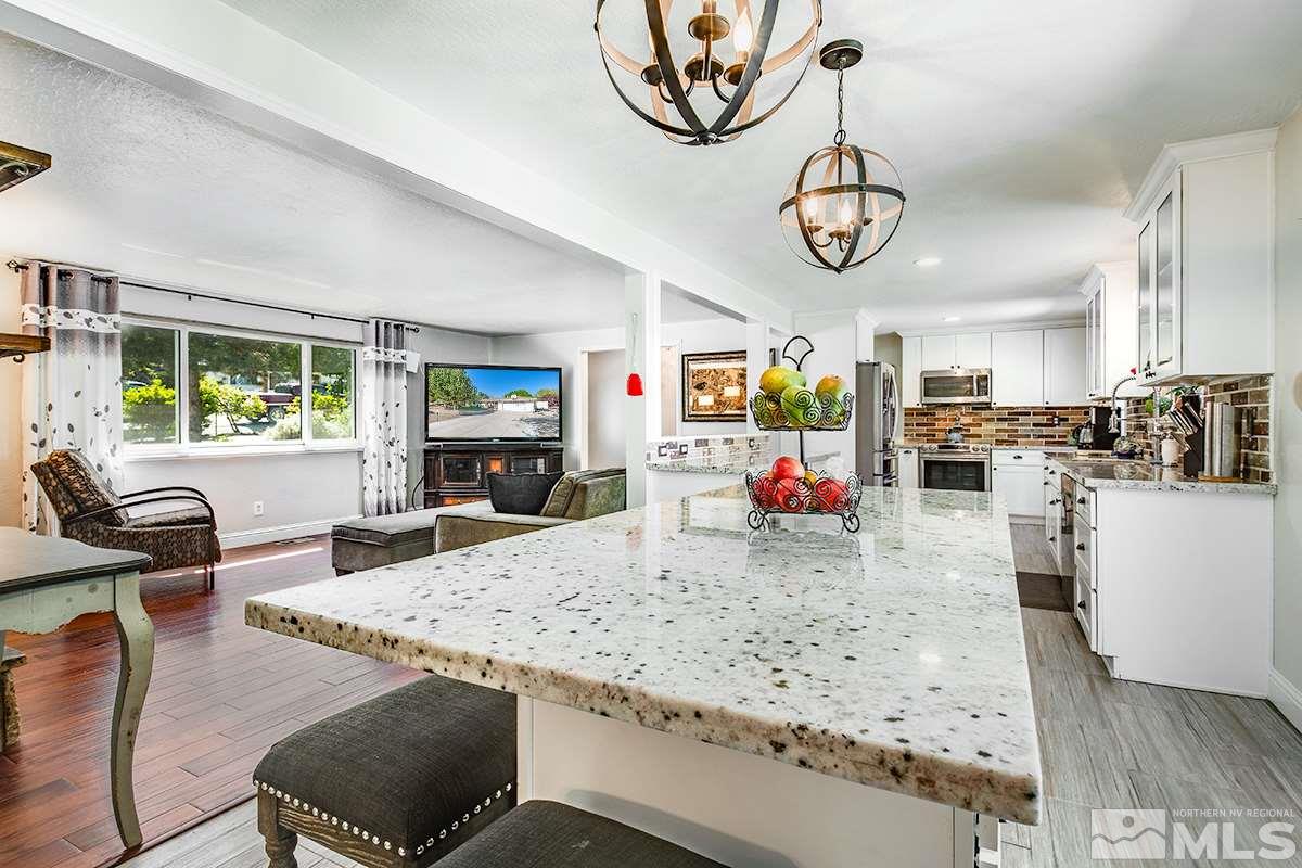 13805 Virginia Foothills Drive Reno, NV 89521 - Photo 15 of 25 a view of a living room and kitchen