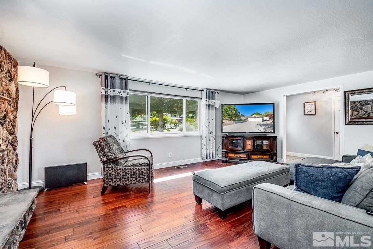 13805 Virginia Foothills Drive Reno, NV 89521 - Photo 10 of 25 a living room with furniture and a window