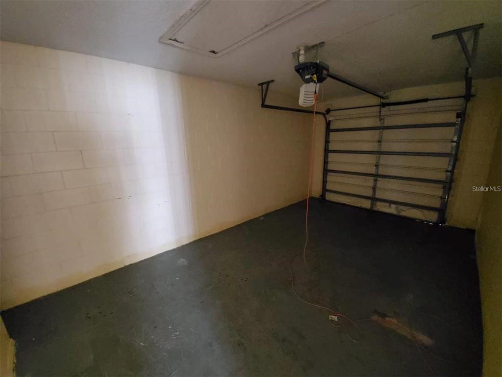 1440 Timberbend Circle Orlando, FL 32824 - Photo 19 of 20 a view of room with stairs and a window