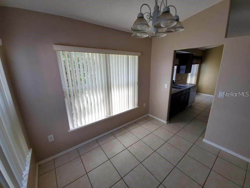 1440 Timberbend Circle Orlando, FL 32824 - Photo 20 of 20 a view of an empty room with a window