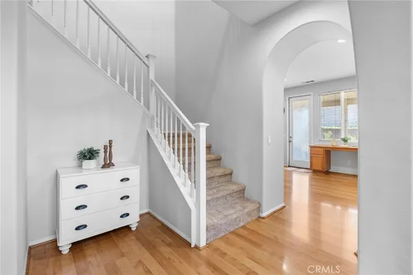 a view of livingroom with furniture and stairs