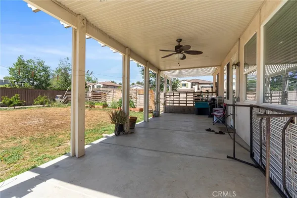 a view of a porch with seating space