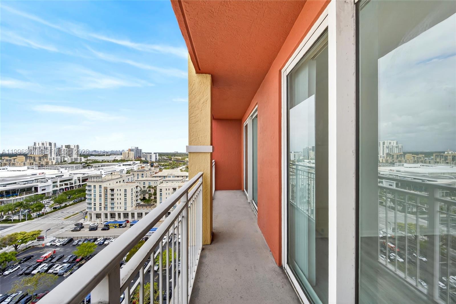 7350 Southwest 89th Street, Unit 1703S Miami, FL 33156 - Photo 20 of 29 a balcony view with an outdoor seating