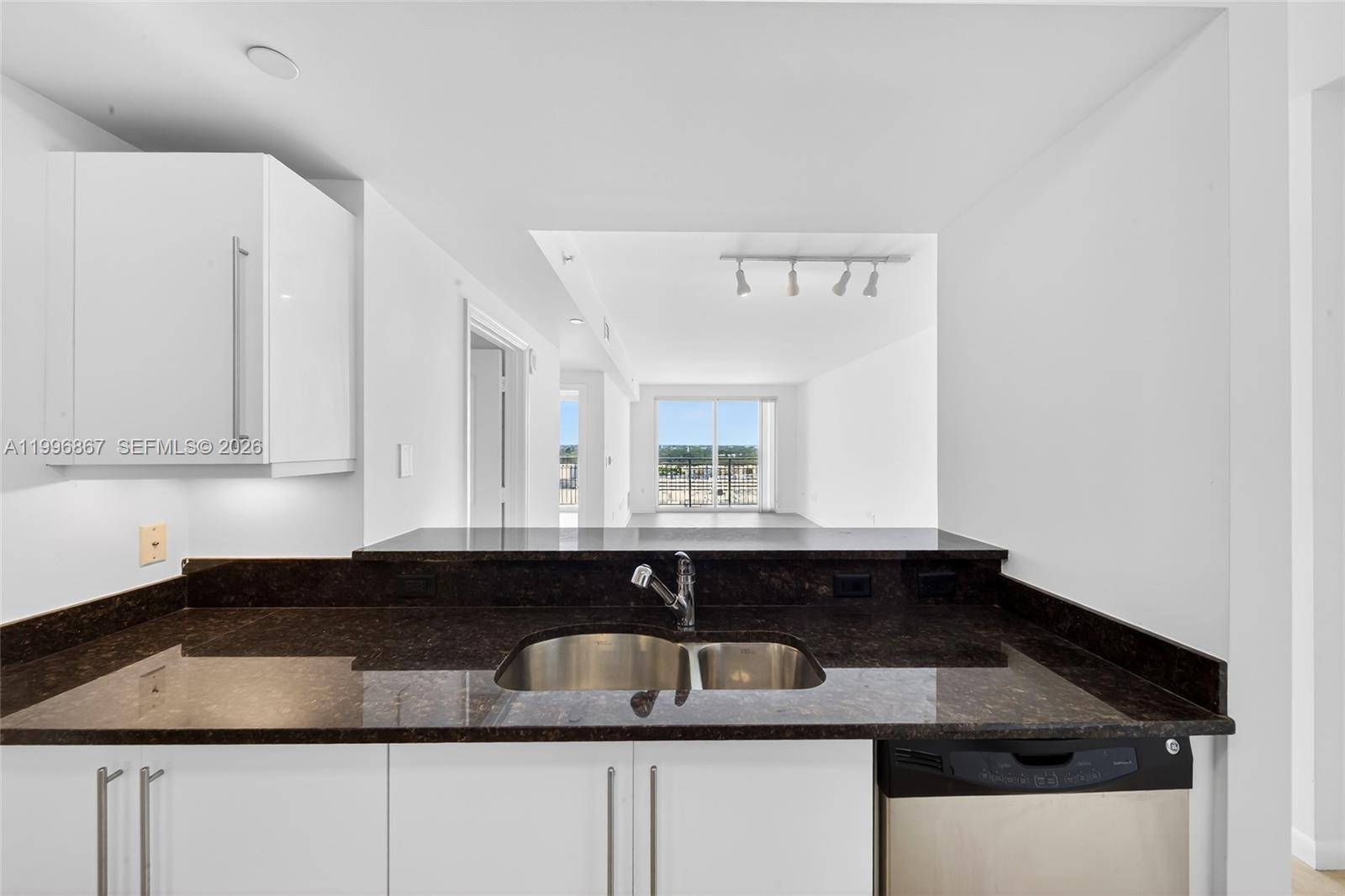 7350 Southwest 89th Street, Unit 1703S Miami, FL 33156 - Photo 6 of 29 a close view of sink and tap