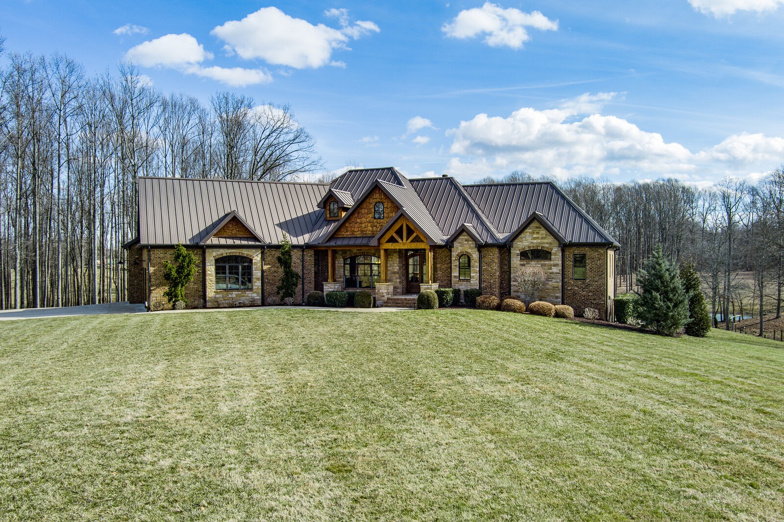 4250 Moss Road Baxter, TN 38544 - Photo 13 of 69 a view of an house with backyard and entertaining space